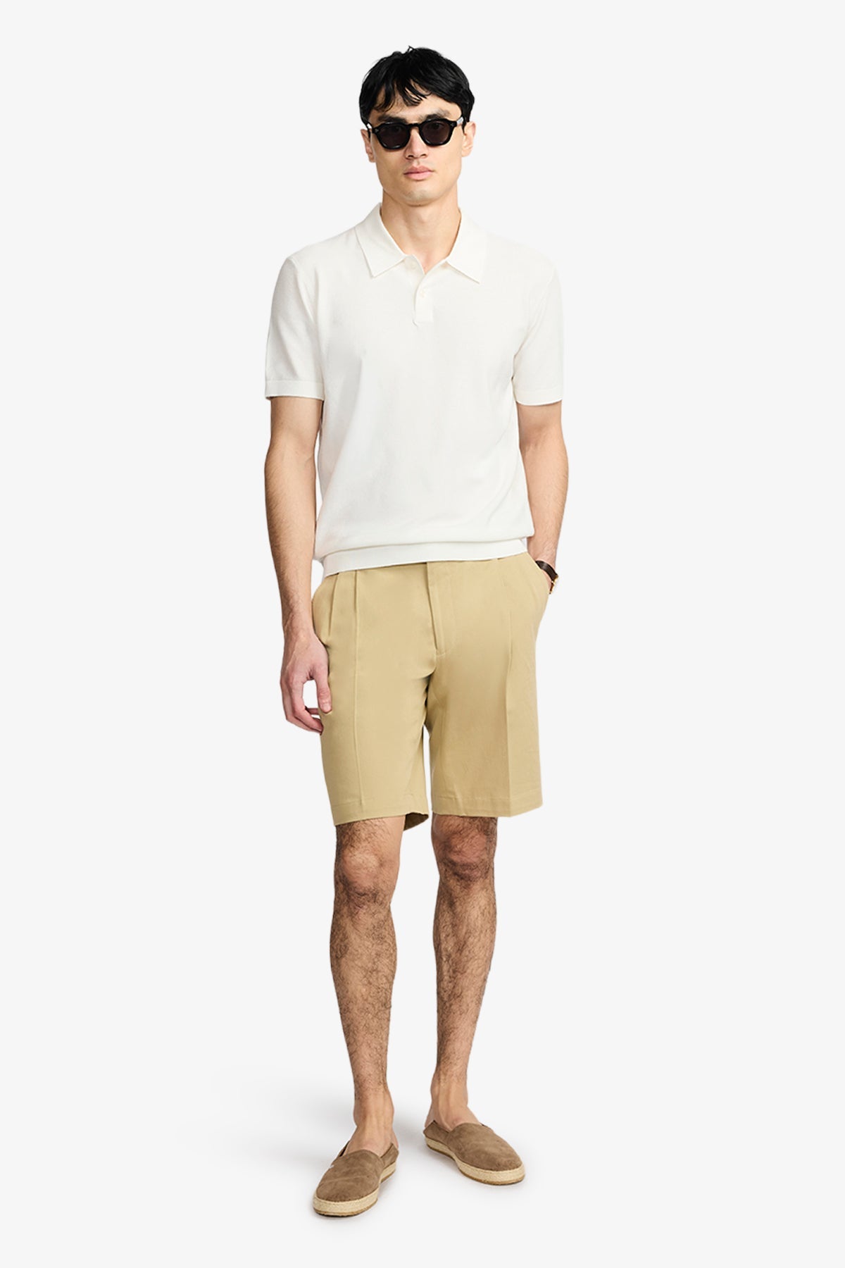 Image of a model wearing Tops. Product name - Frame White Honeycomb Polo in White colour by brand - Anthony Squires