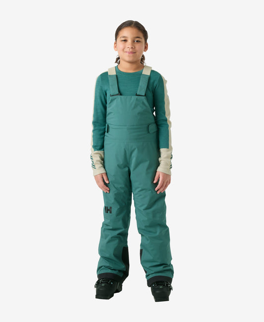 Image of a model wearing Pants. Product name - JR GIRL STELLAR BIB PANT, Opal Green in Opal Green colour by brand - Helly Hansen