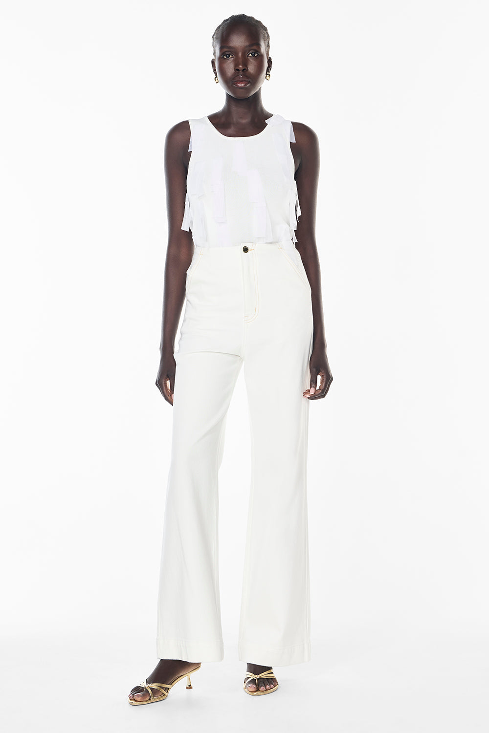 Image of a model wearing Tops. Productname: Fringe Accents Top in WHITE colour by brand - Manning Cartell