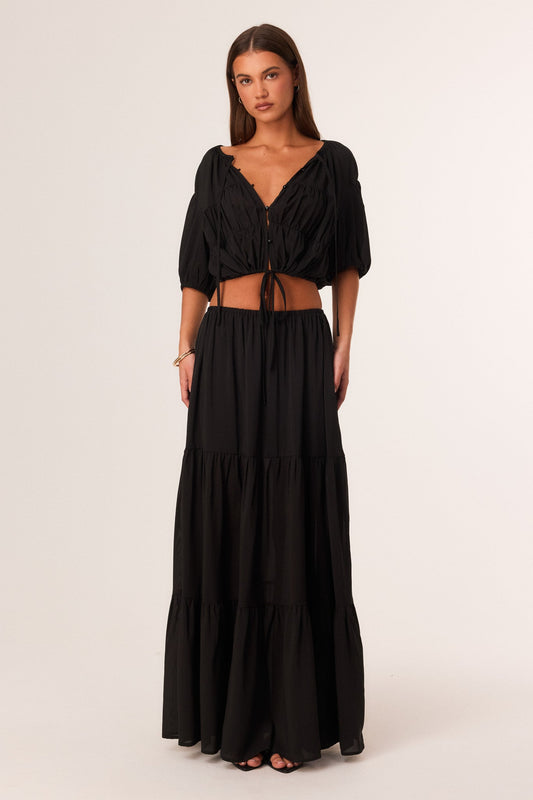 Image of a model wearing Skirts. Productname: SNDYS ABBEY MAXI SKIRT in Black colour by brand - SNDYS