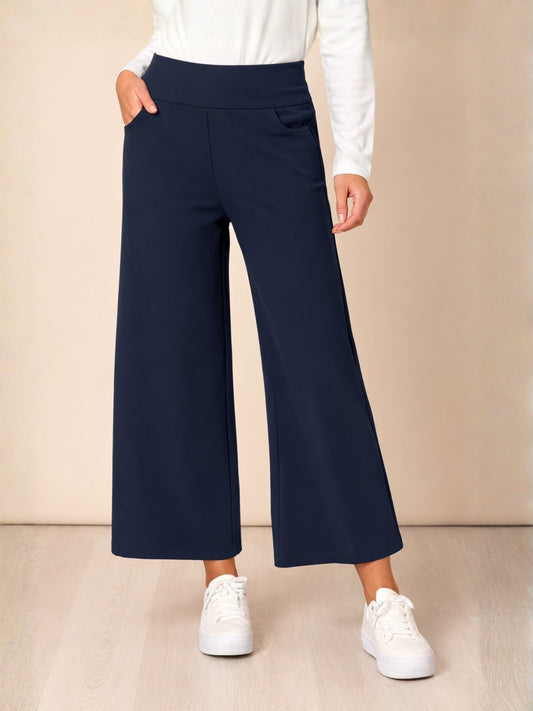 Image of a model wearing Pants. Product name - Kimmy Ponti Wide Leg Pant Navy in Navy colour by brand - Clarity