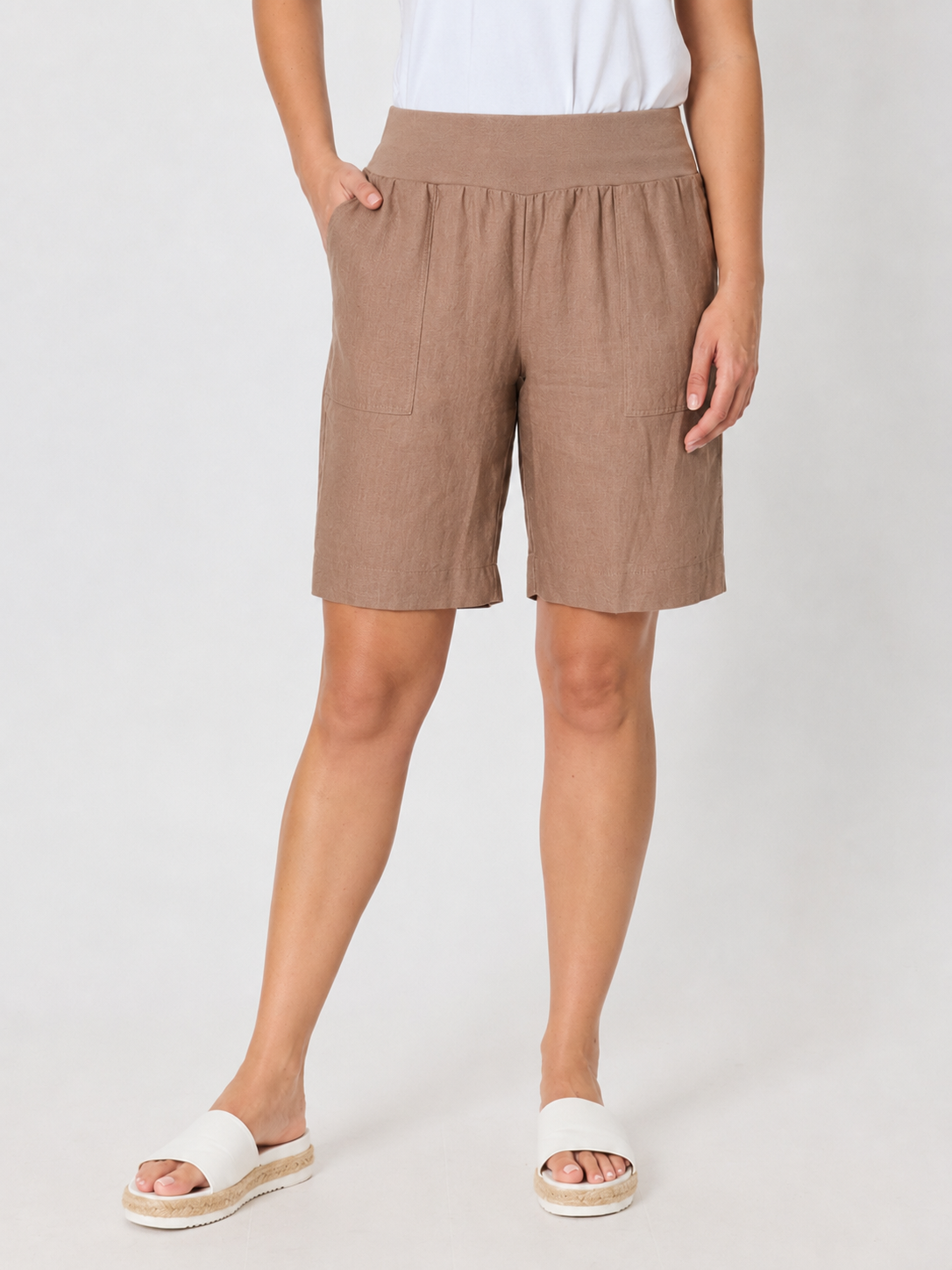 Image of a model wearing Shorts. Product name - Jordan Linen Short Mocha in Mocha colour by brand - Gordon Smith