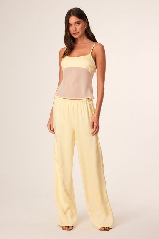 Image of a model wearing Pants. Productname: SNDYS ZOE PANTS in Butter colour by brand - SNDYS