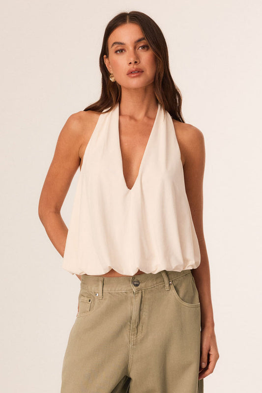 Image of a model wearing Tops. Productname: SNDYS TAKODA TOP in Vanilla colour by brand - SNDYS