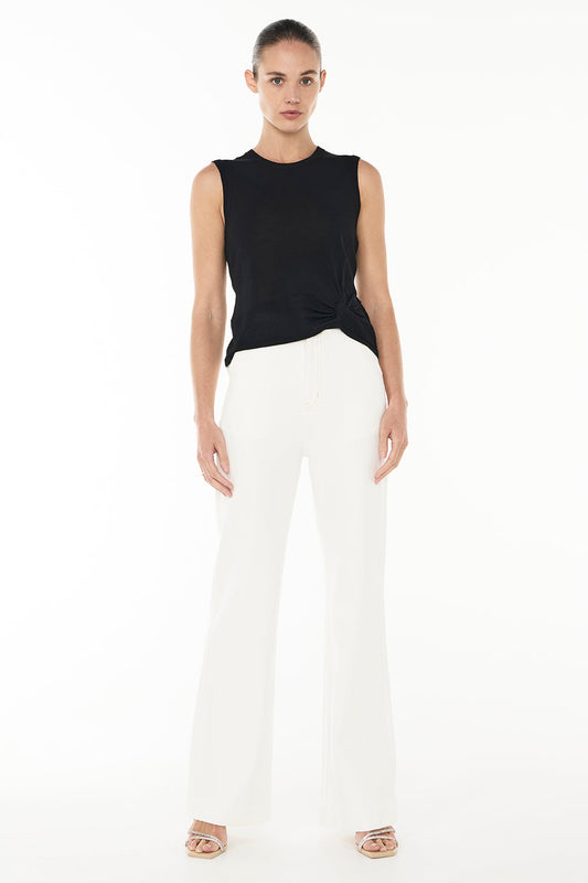 Image of a model wearing Tops. Productname: Twisted Knit Top in BLACK colour by brand - Manning Cartell