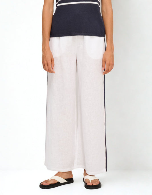 Image of a model wearing Pants. Productname: Monaco Pants - in White/Navy colour by brand - Little Lies