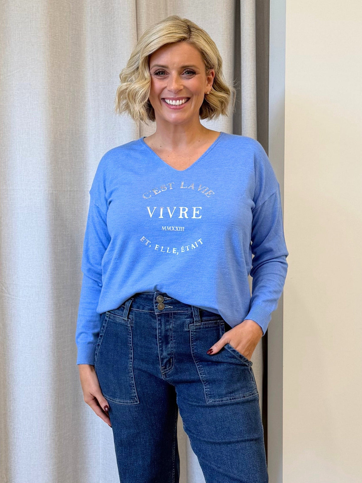 Image of a model wearing Tops. Product name - Cest La Vie Sweatshirt Sky Blue in Sky Blue colour by brand - Threadz