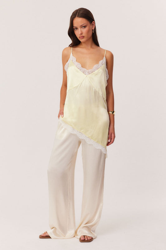 Image of a model wearing Tops. Productname: SNDYS TONI CAMI TOP in Sour Lemon colour by brand - SNDYS