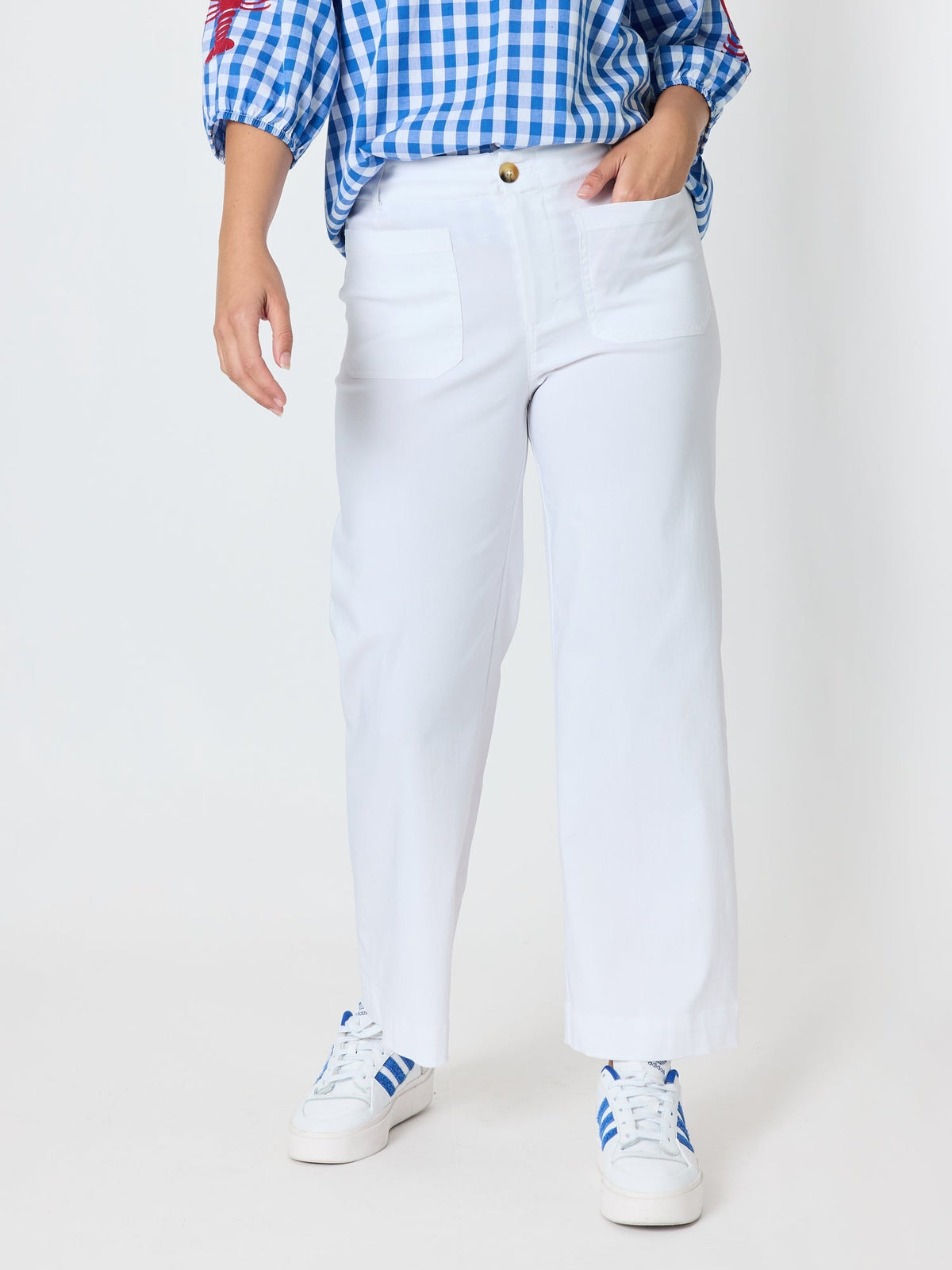 Image of a model wearing Pants. Product name - Marine Wide Leg Pant White in White colour by brand - Threadz
