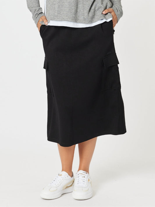 Image of a model wearing Skirts. Product name - Urban Cargo Skirt Black in Black colour by brand - Threadz
