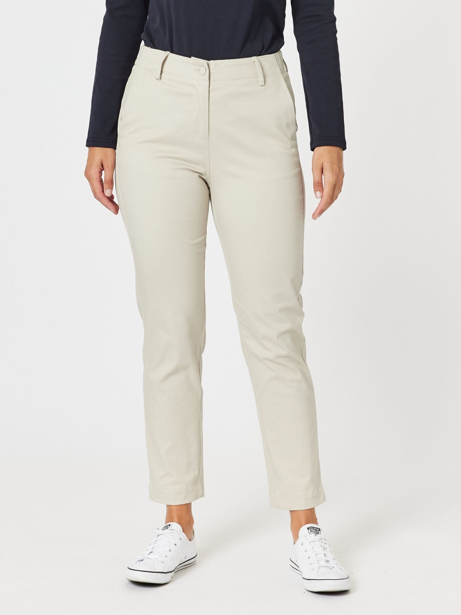 Image of a model wearing Pants. Product name - The Chino Pant Stone in Stone colour by brand - Gordon Smith