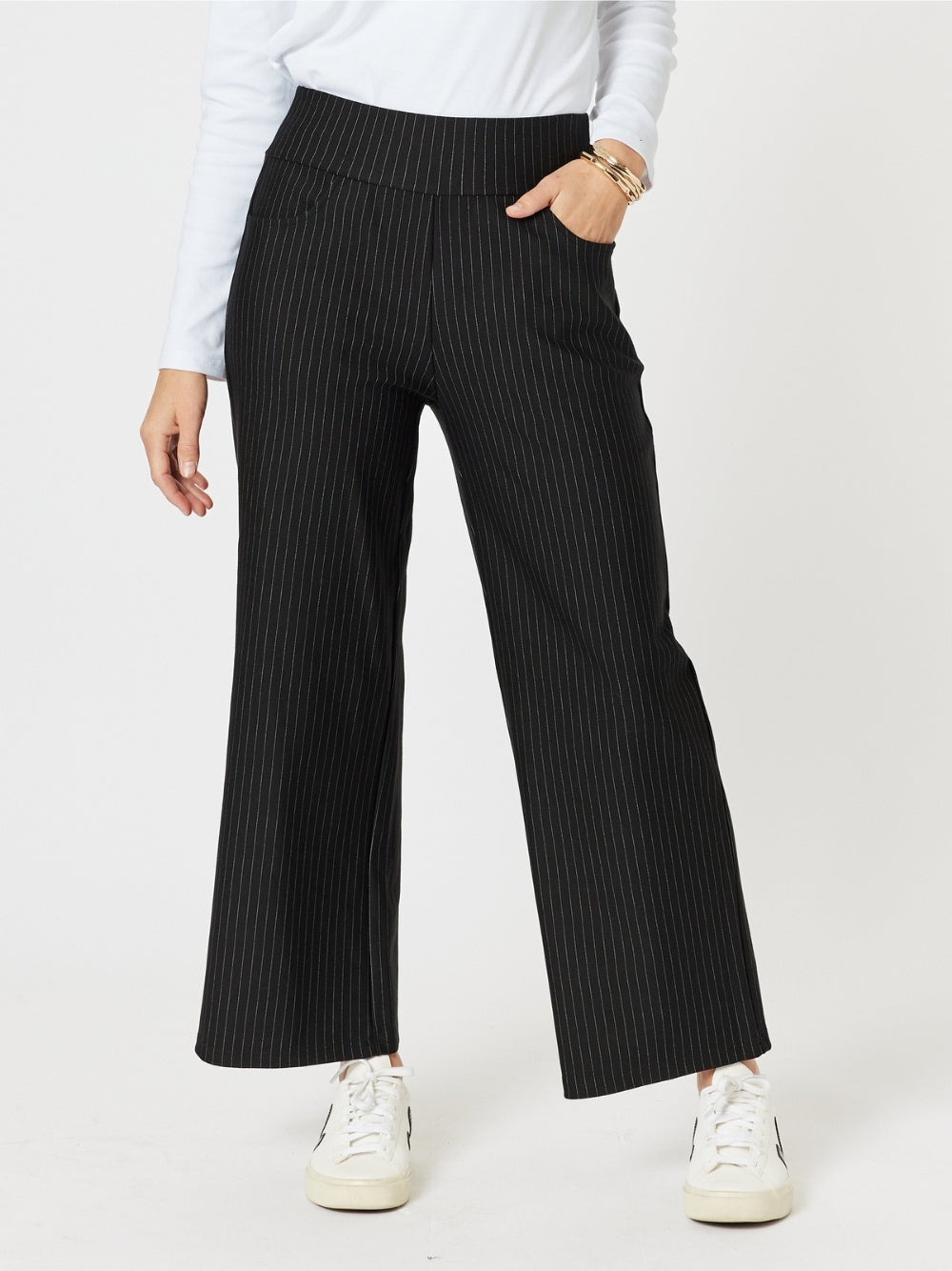 Image of a model wearing Pants. Product name - Nicky Pant Natural/Black in Natural/Black colour by brand - Clarity
