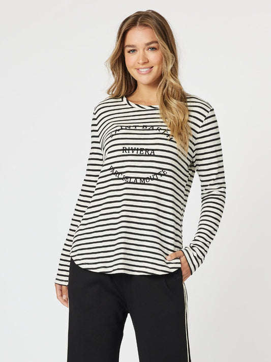 Image of a model wearing Tops. Product name - Riviera Long Sleeve Stripe Print Tee Black/White in Black/White colour by brand - Threadz