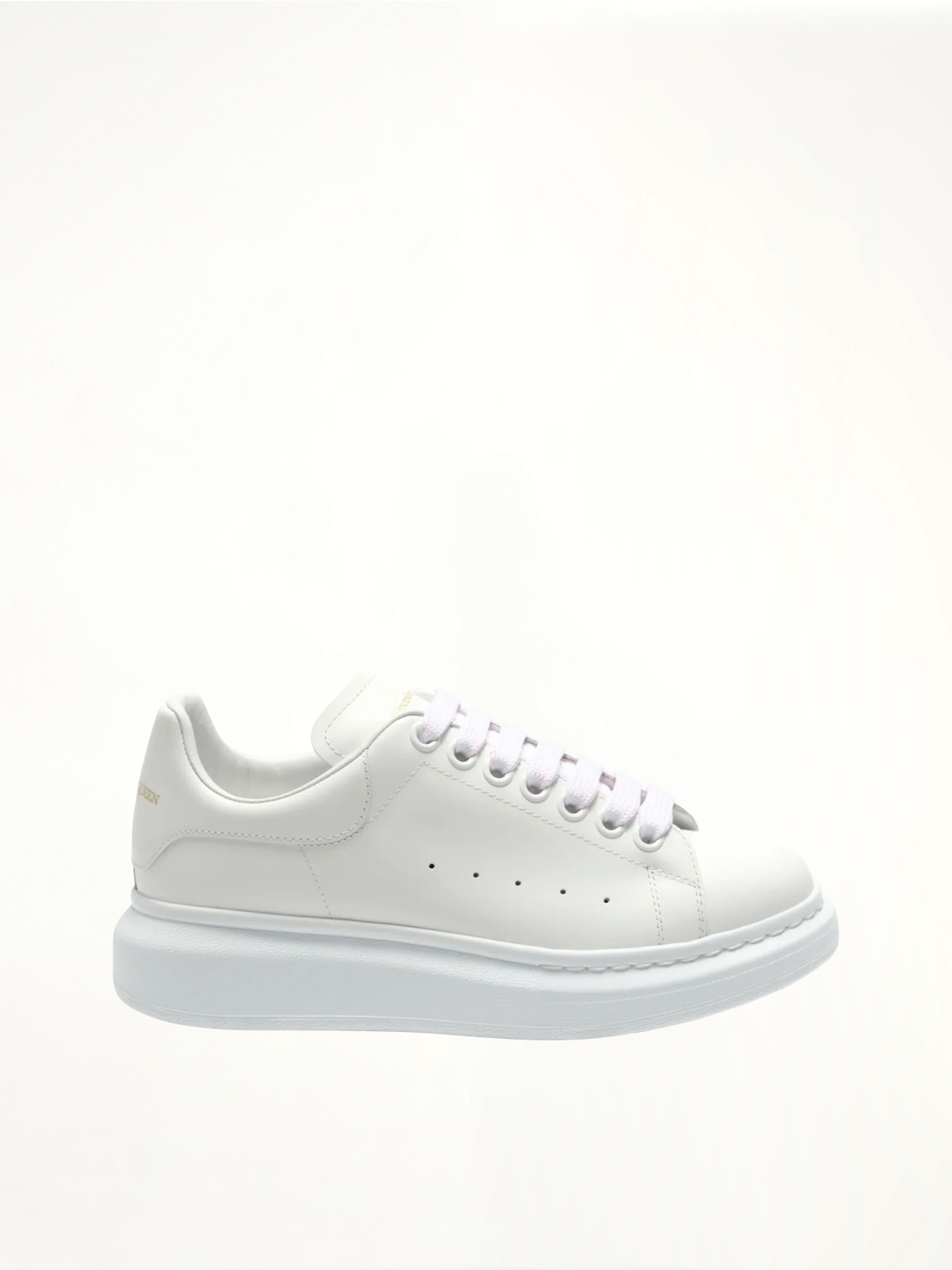 Image of Sneakers. Product name - Larry Oversized Sneakers in White colour by brand - ALEXANDER MCQUEEN