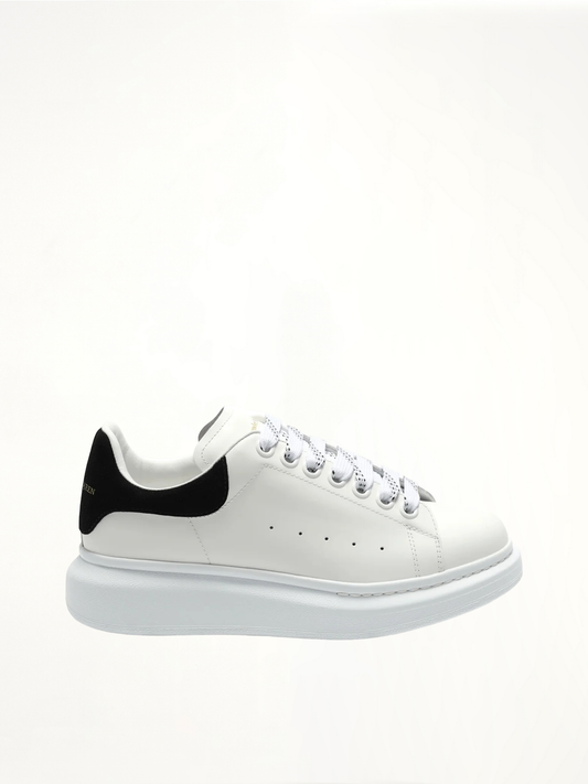 Image of Sneakers. Product name - Larry Oversized Suede Sneakers in White colour by brand - ALEXANDER MCQUEEN