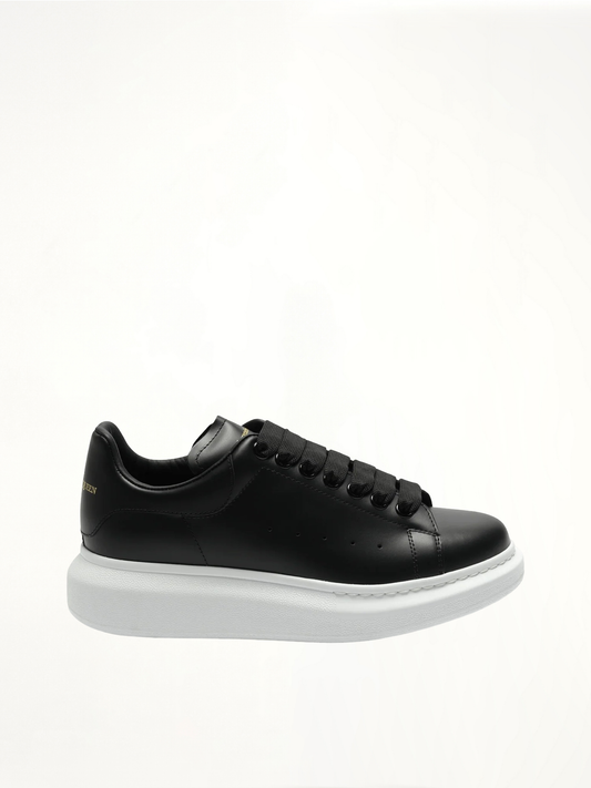 Image of Sneakers. Product name - Larry Oversized Sneakers in Black colour by brand - ALEXANDER MCQUEEN