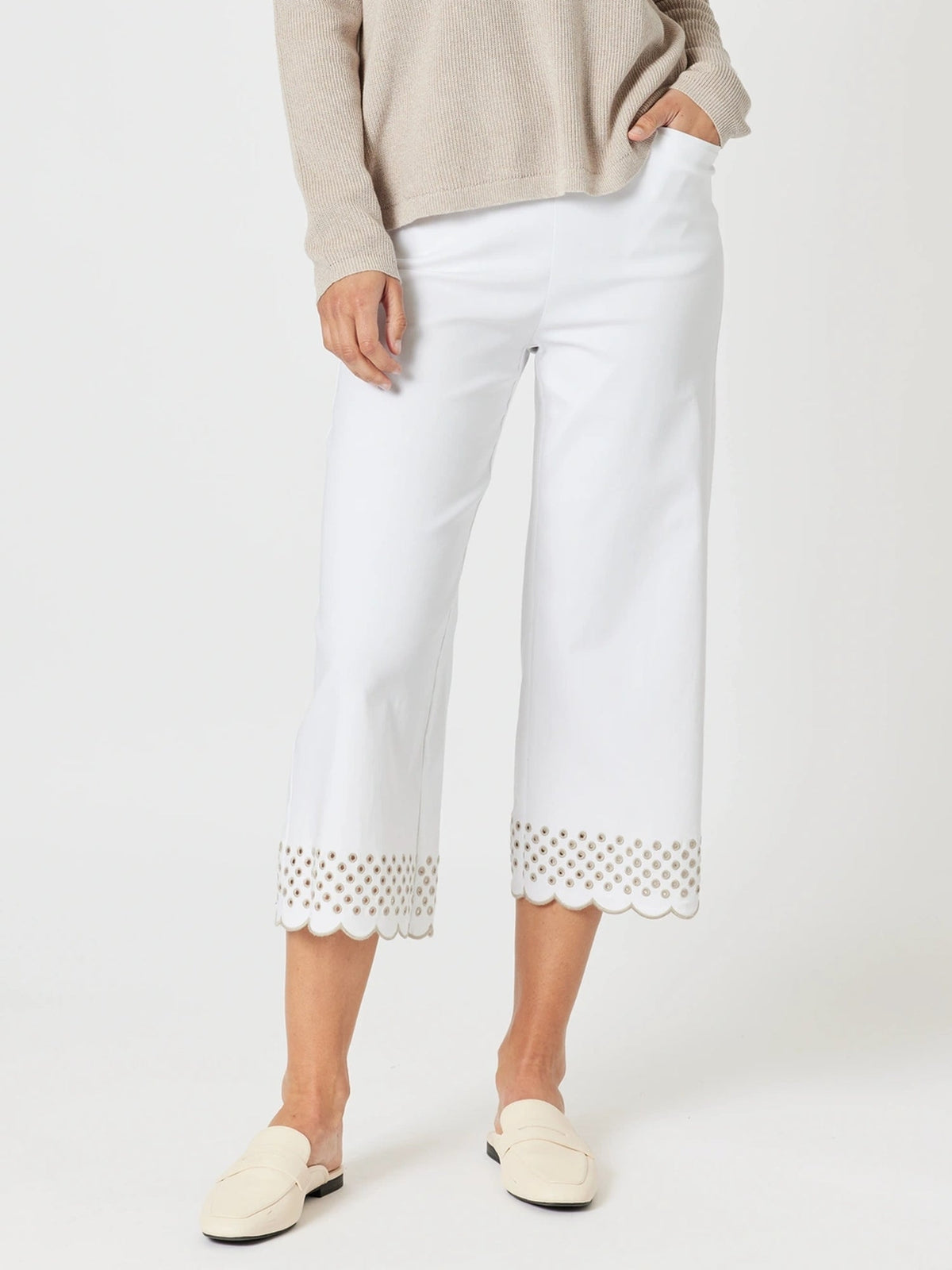 Image of a model wearing Pants. Product name - Scallop Hem Pant White/Natural in White/Natural colour by brand - Gordon Smith