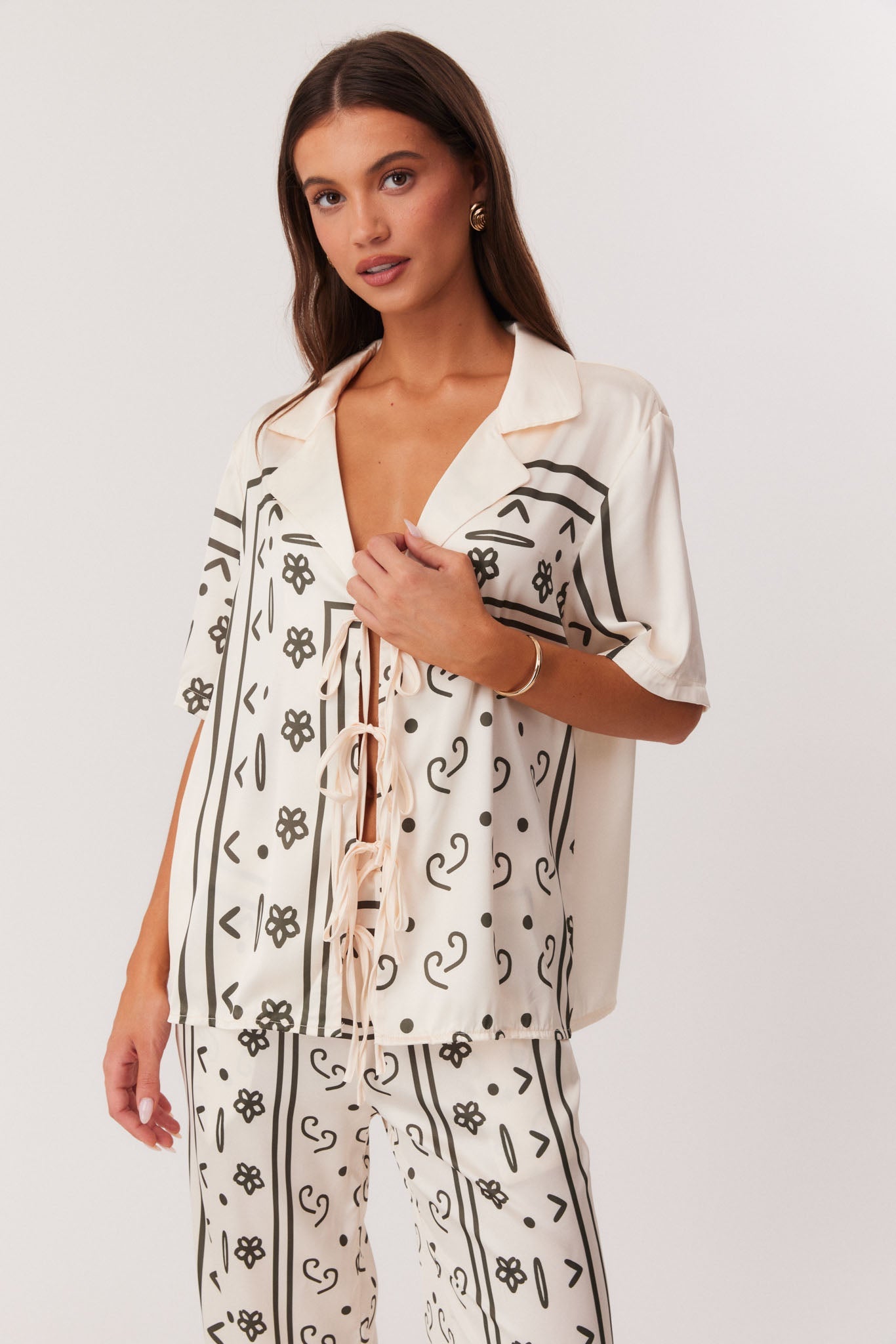 Image of a model wearing Tops. Productname: SNDYS SILAS SHIRT in Boho Print colour by brand - SNDYS
