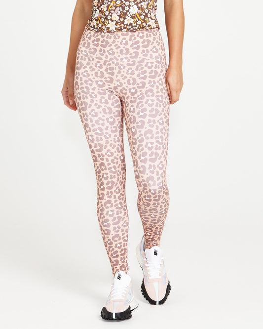 Image of a model wearing Pants. Product name - Alessia Reversible Active Tights Chocolate Floral/Pink Cheetah in Chocolate Floral/Pink Cheetah colour by brand - Sass Clothing