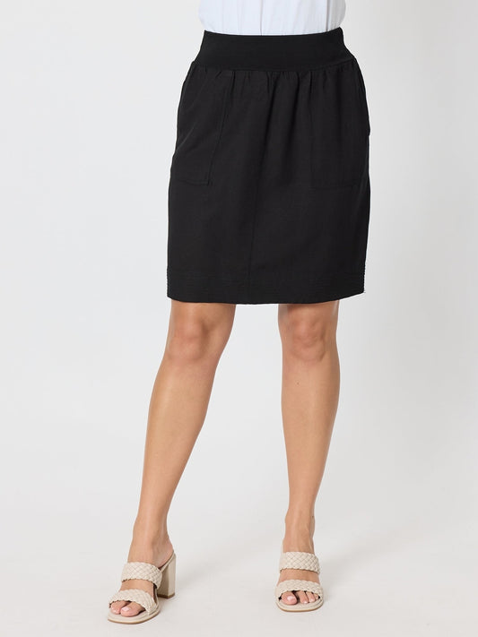 Image of a model wearing Skirts. Product name - Lino Stitch Hem Detail Skirt Black in Black colour by brand - Gordon Smith