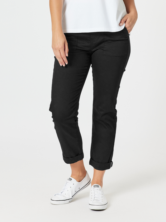 Image of a model wearing Pants. Product name - New Isabella Pant Black in Black colour by brand - Threadz