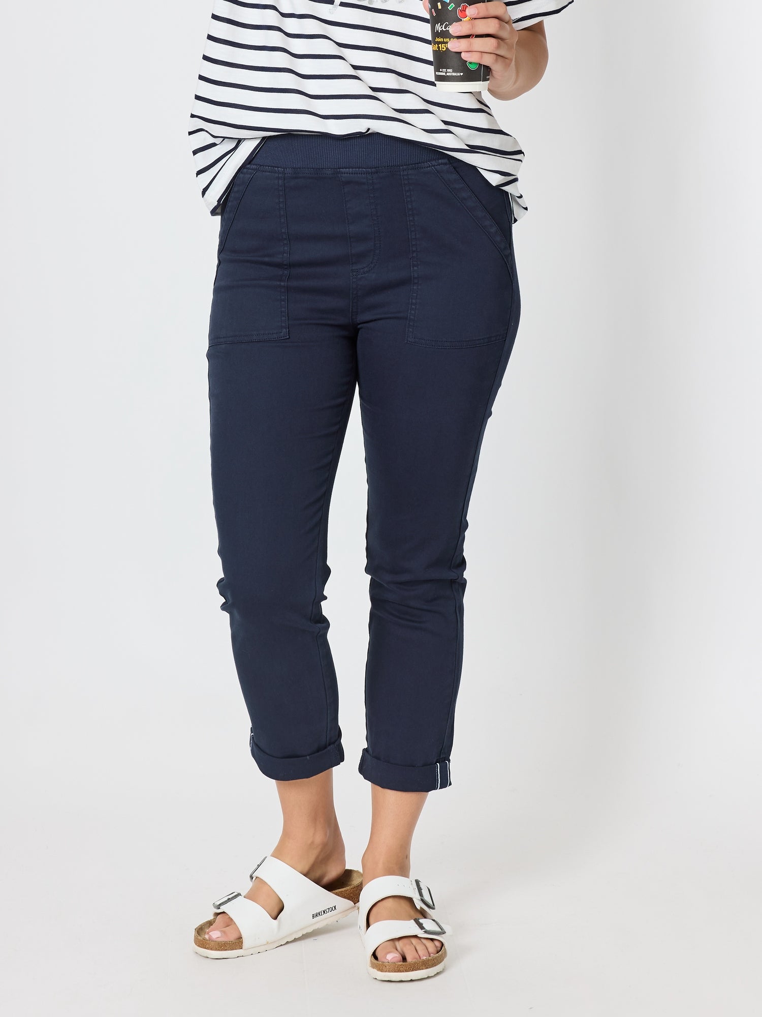 Image of a model wearing Pants. Product name - New Isabella Pant Navy in Navy colour by brand - Threadz