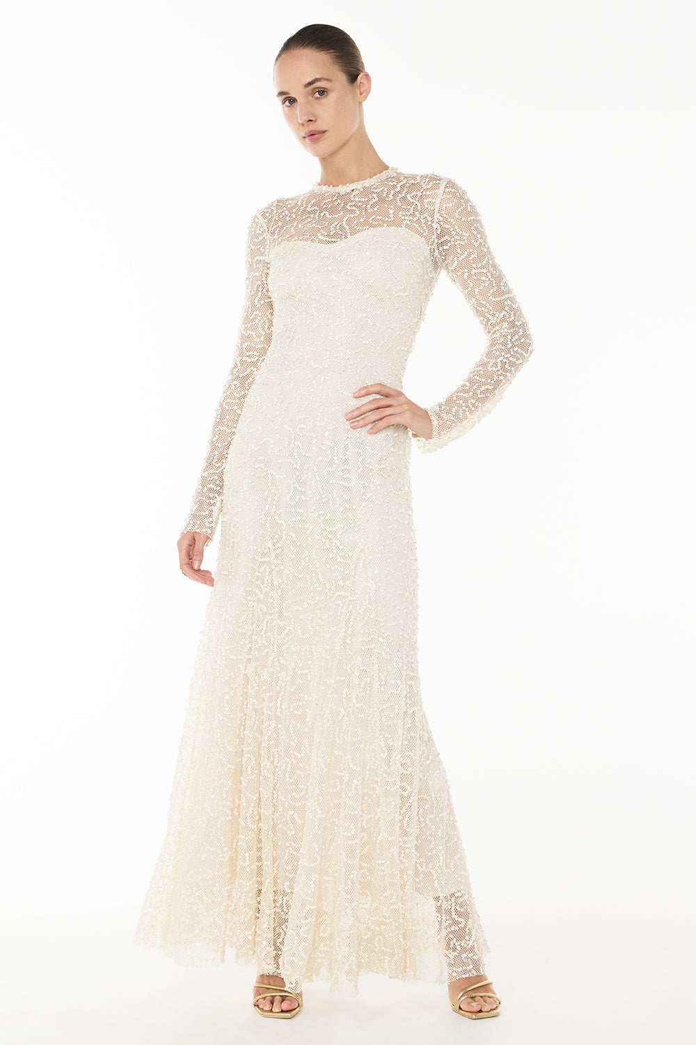 Image of a model wearing Tops. Productname: Opera Buff Long Sleeve Dress in TUSK colour by brand - Manning Cartell