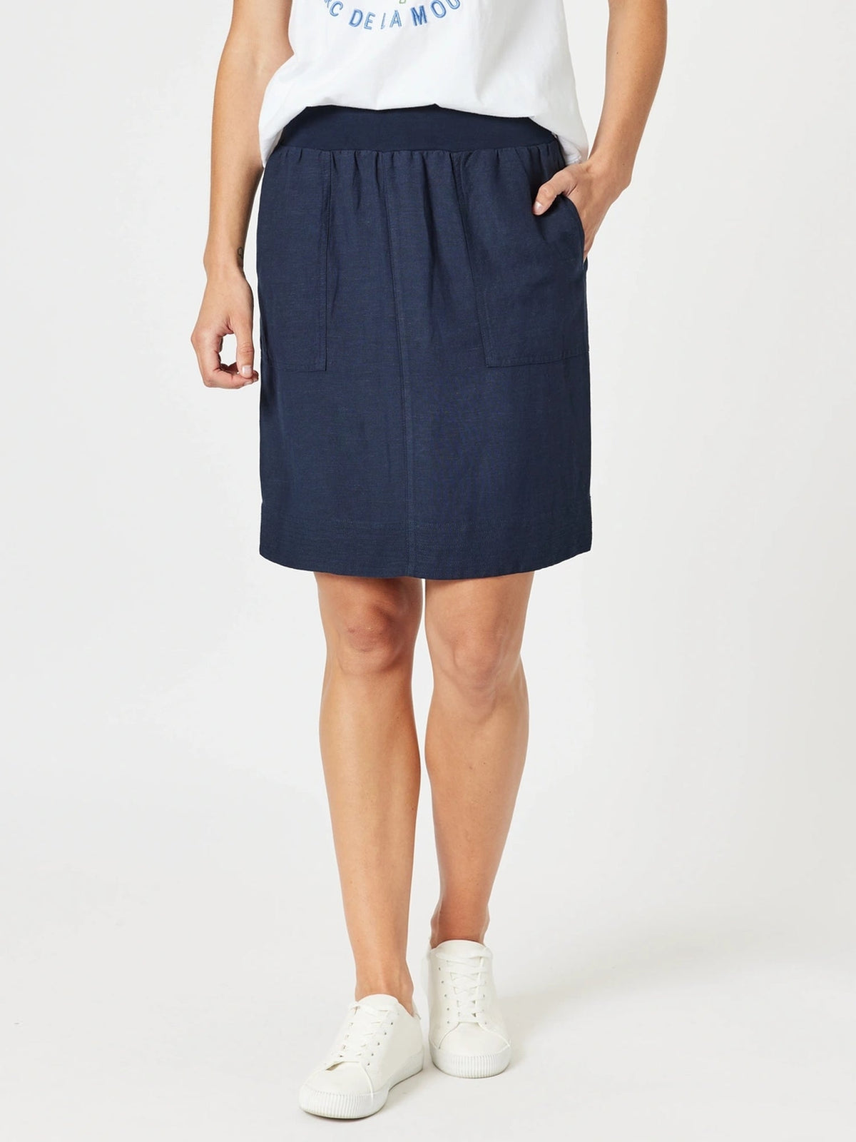 Image of a model wearing Skirts. Product name - Lino Stitch Hem Detail Skirt Navy in Navy colour by brand - Gordon Smith