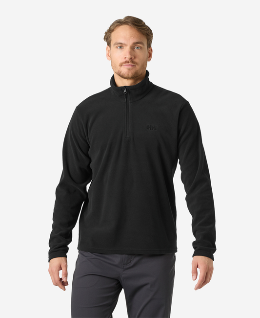 Image of a model wearing Outerwear. Product name - DAYBREAKER 1/2 ZIP FLEECE, Black in Black colour by brand - Helly Hansen