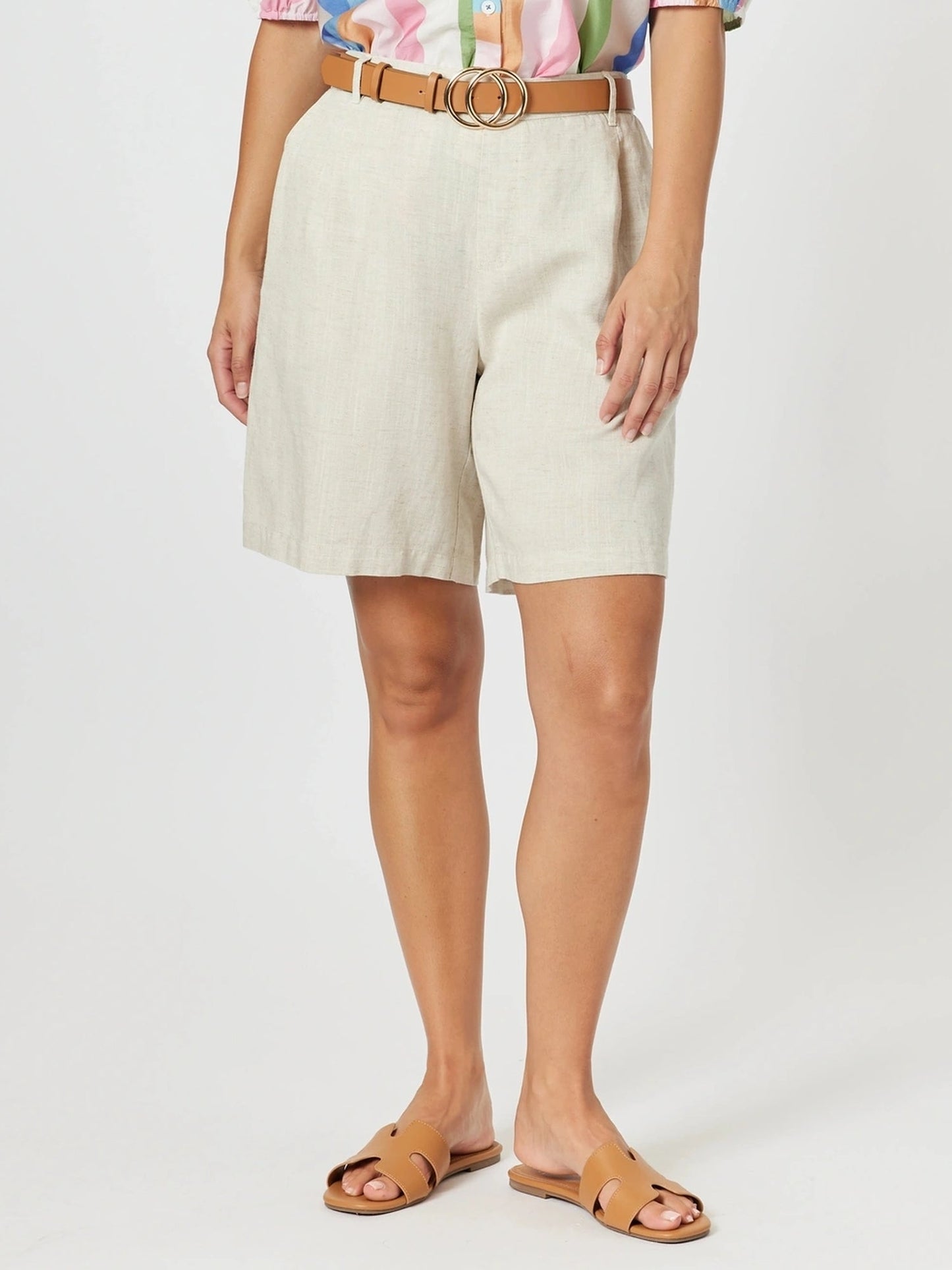 Image of a model wearing Shorts. Product name - The Lino Short Natural in Natural colour by brand - Gordon Smith