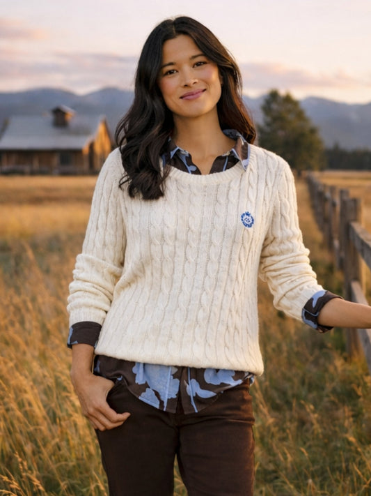 Image of a model wearing Tops. Product name - Hampton Cable Jumper Ivory in Ivory colour by brand - Gordon Smith