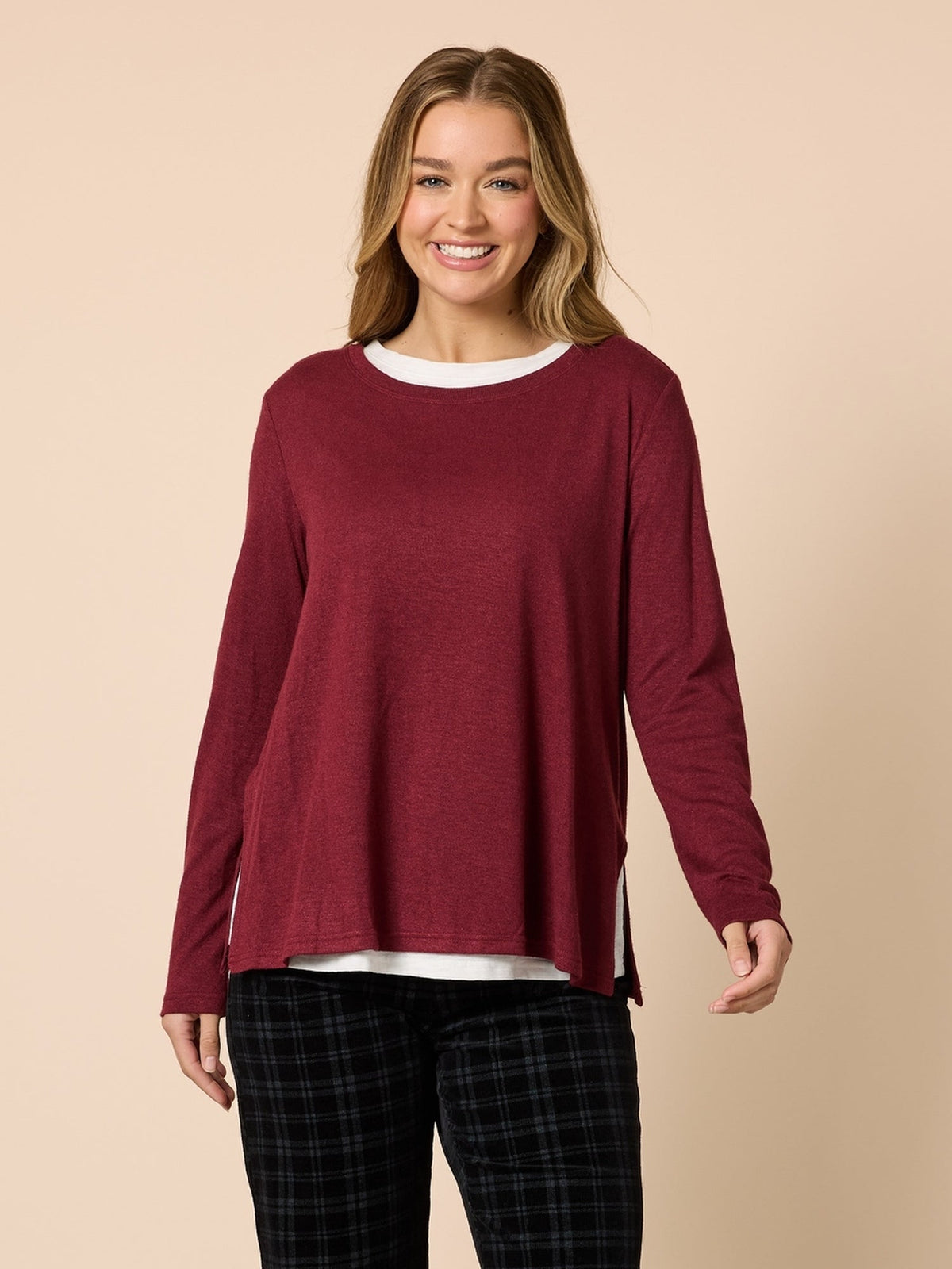 Image of a model wearing Tops. Product name - Alicia 2 in 1 Top Shiraz in Shiraz colour by brand - Threadz