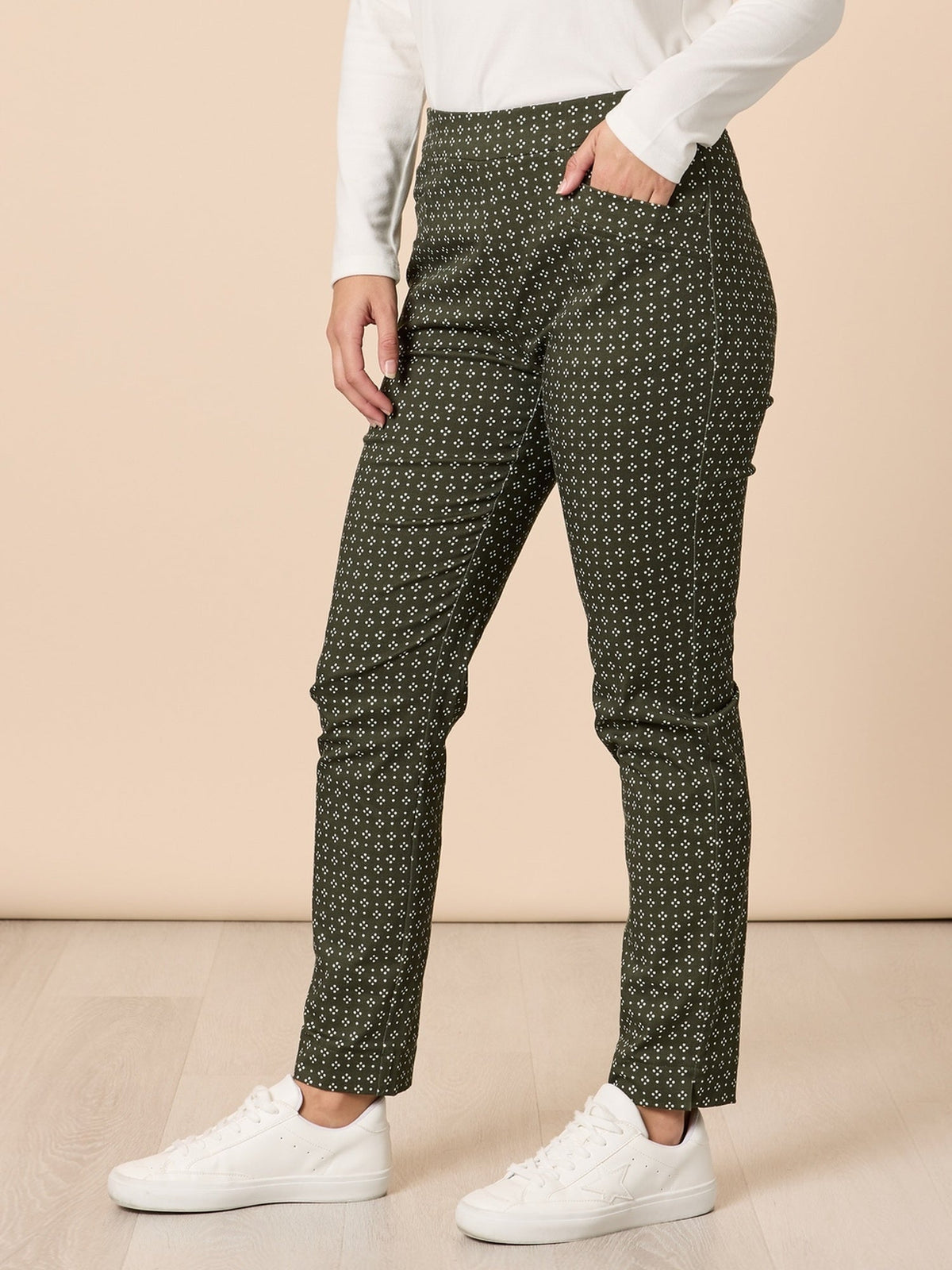 Image of a model wearing Pants. Product name - Kelly Print Pant Khaki in Khaki colour by brand - Gordon Smith