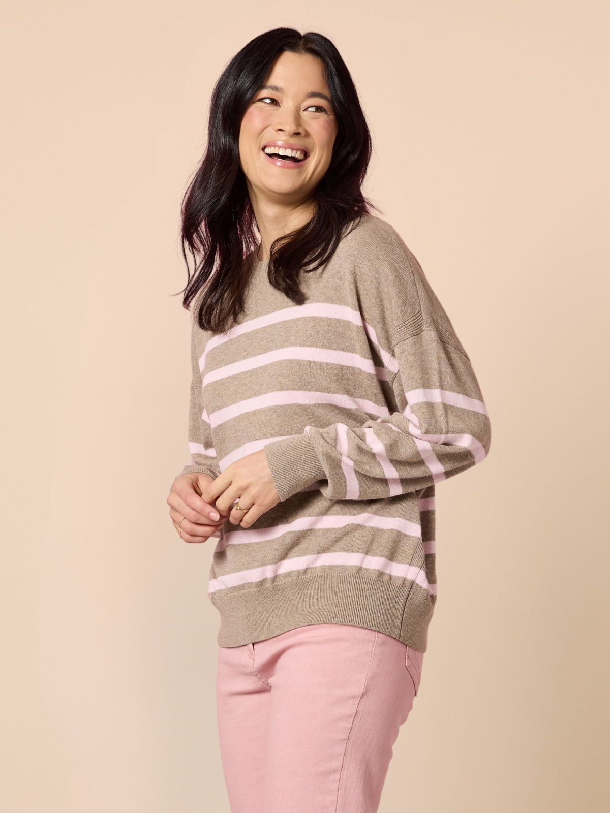 Image of a model wearing Tops. Product name - Idaho Stripe Knit Natural Blush in Natural Blush colour by brand - Gordon Smith