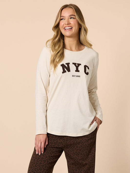 Image of a model wearing Tops. Product name - The NYC Long Sleeve Tee Natural in Natural colour by brand - Threadz