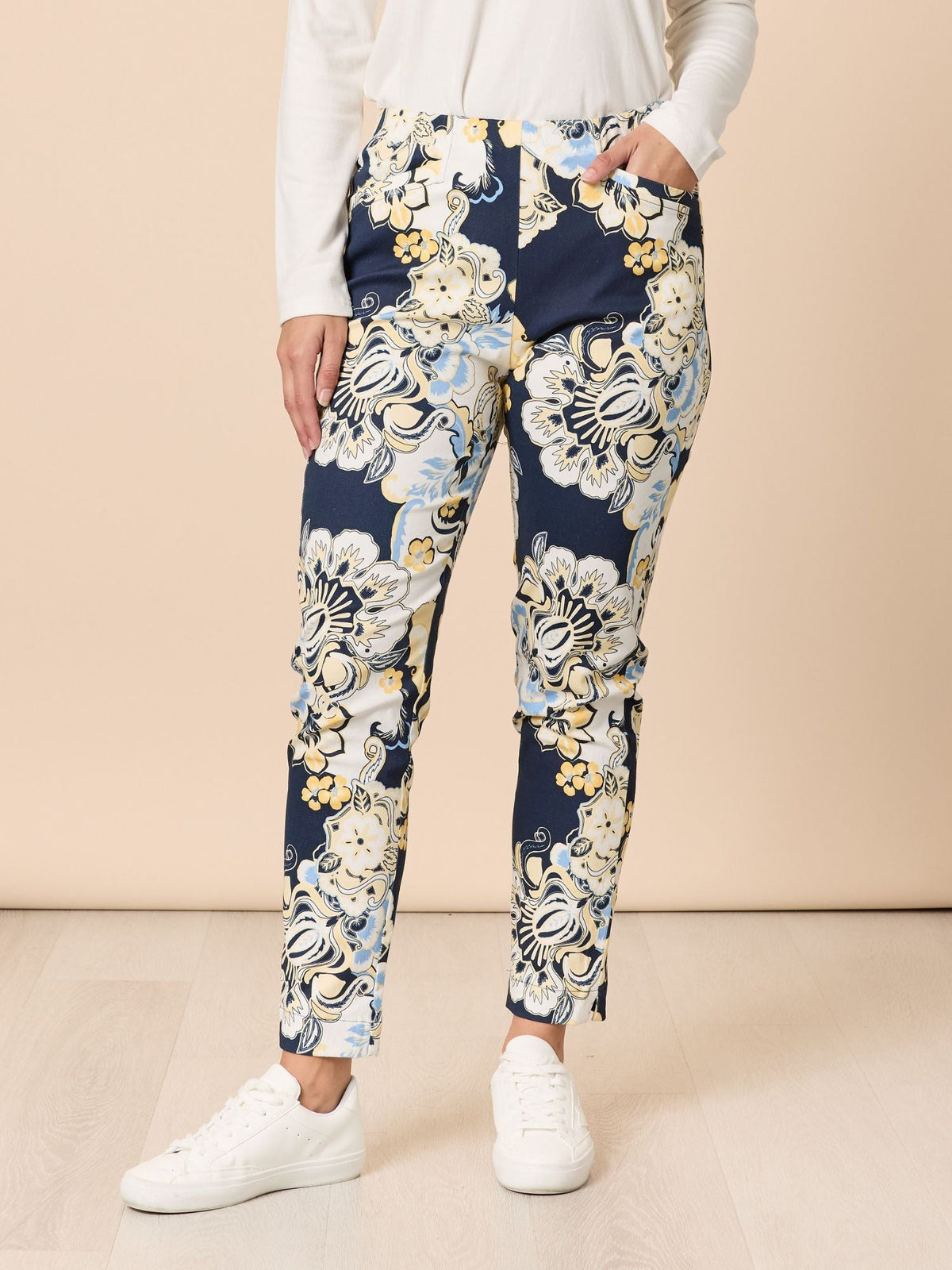 Image of a model wearing Pants. Product name - Newport Print Pant Navy Multi in Navy Multi colour by brand - Gordon Smith