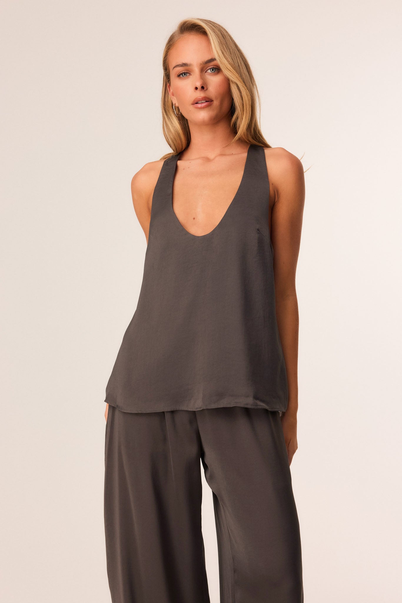 Image of a model wearing Tops. Productname: SNDYS BAMBI TOP in Charcoal colour by brand - SNDYS