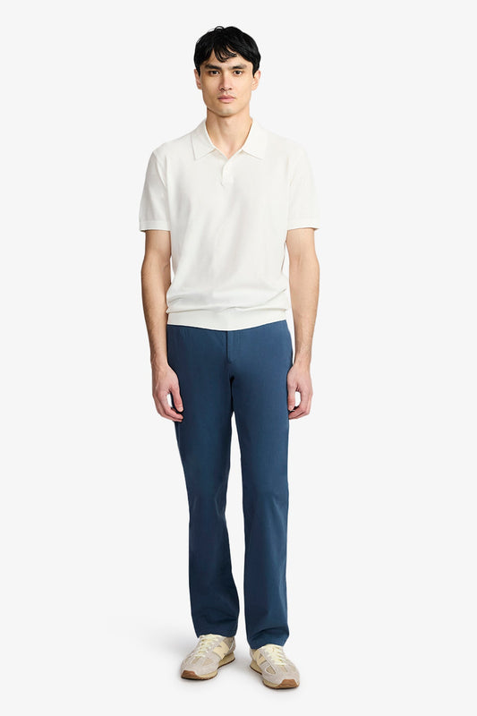 Image of a model wearing Pants. Product name - Austin Chino Dusty Blue Twill in Blue colour by brand - Anthony Squires