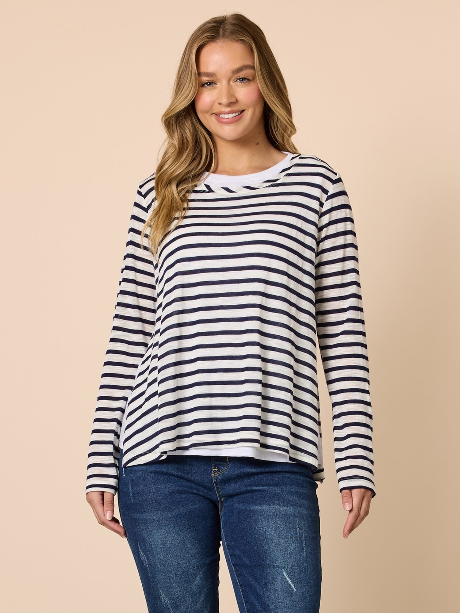 Image of a model wearing Tops. Product name - The Duo Stripe Top Navy/Ivory in Navy/Ivory colour by brand - Threadz