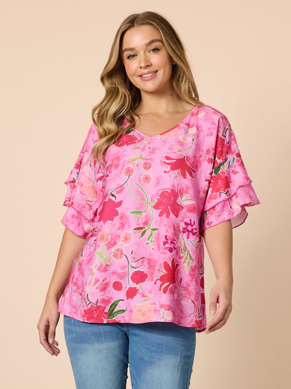 Image of a model wearing Tops. Product name - Summer Gala Floral Print Top Hot Pink in Hot Pink colour by brand - Clarity