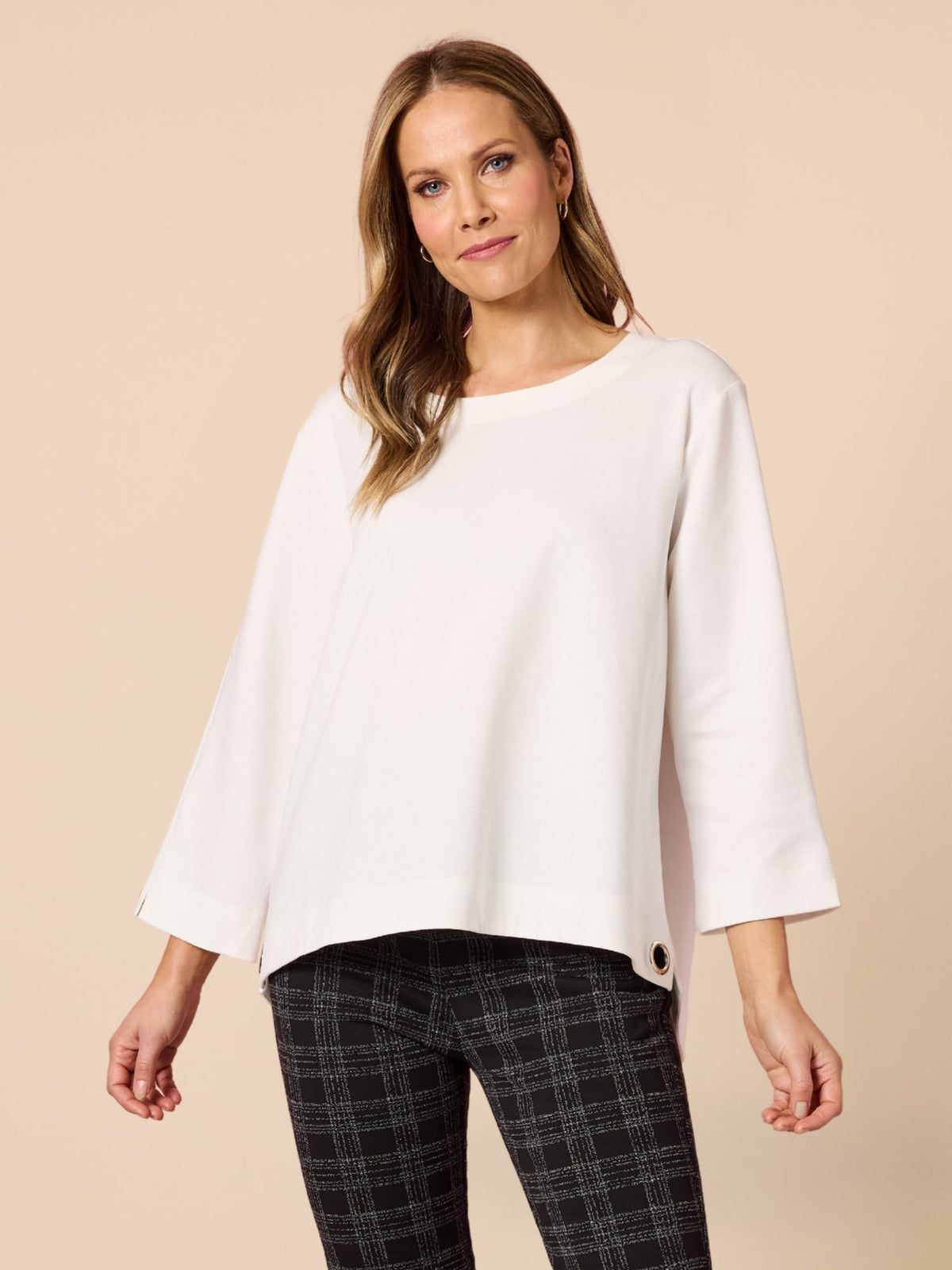 Image of a model wearing Tops. Product name - Provence Top Ivory in Ivory colour by brand - Clarity