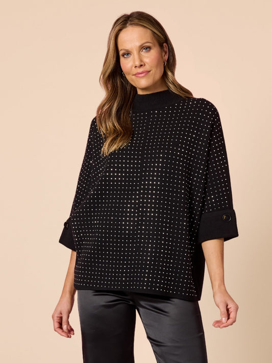 Image of a model wearing Tops. Product name - Luce Jumper Black in Black colour by brand - Hammock & Vine