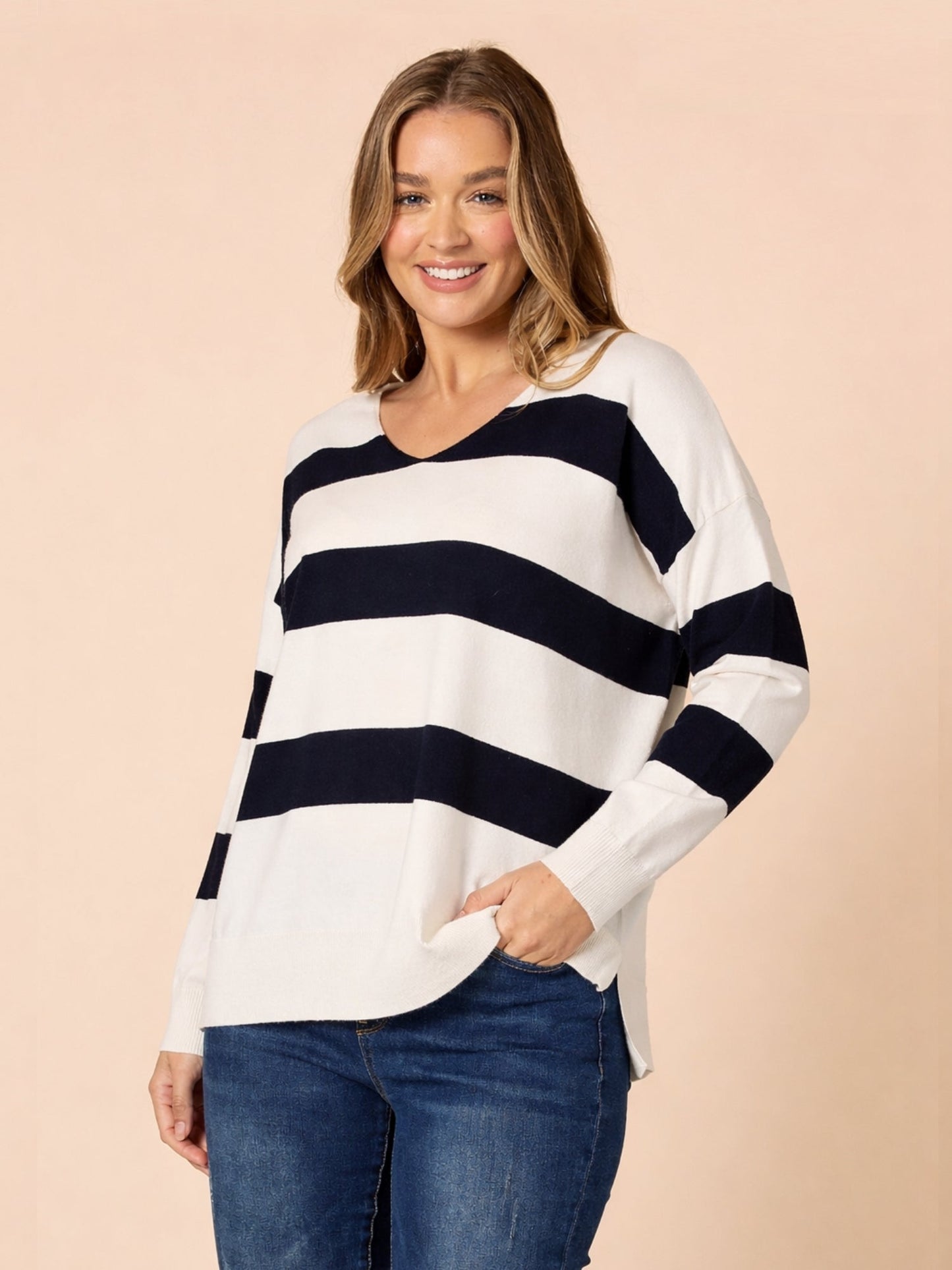 Image of a model wearing Tops. Product name - Crew Stripe Knit Navy/Ivory in Navy/Ivory colour by brand - Threadz