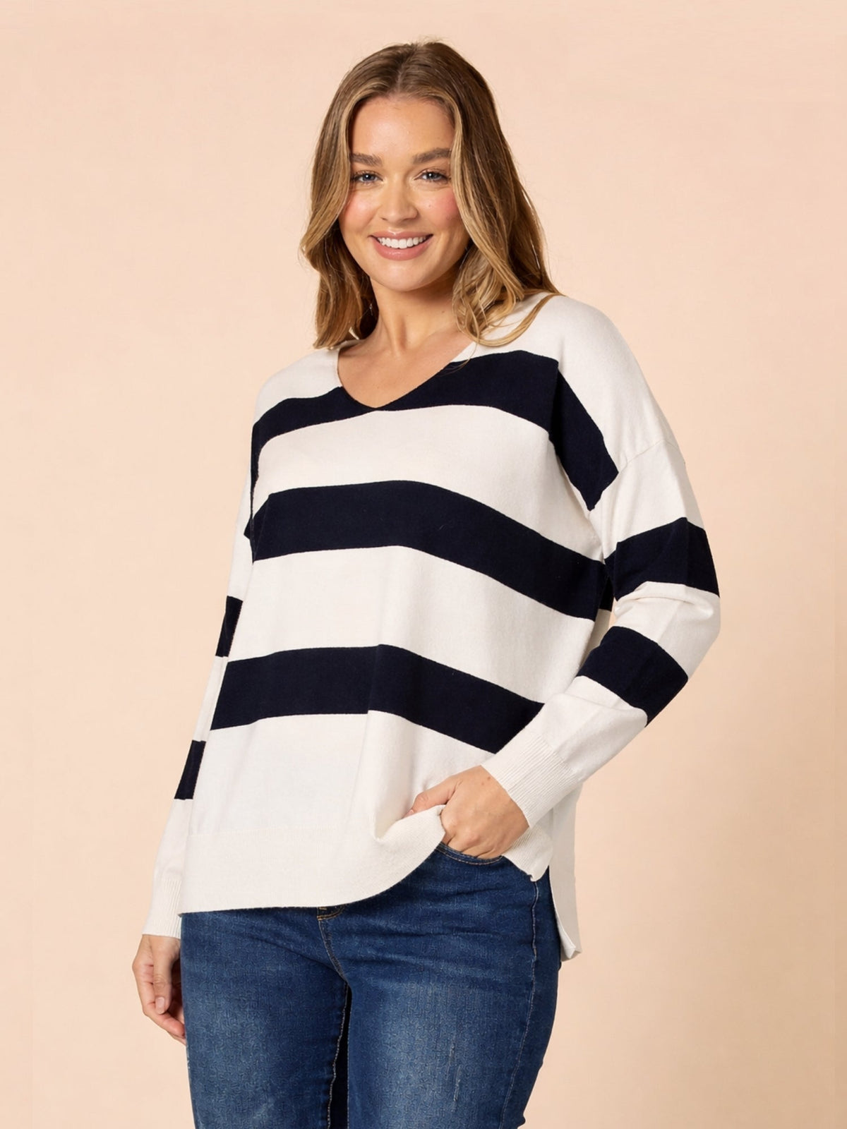 Image of a model wearing Tops. Product name - Crew Stripe Knit Navy/Ivory in Navy/Ivory colour by brand - Threadz