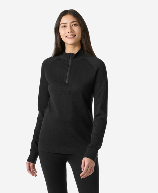 Image of a model wearing Tops. Product name - W LIFA MERINO KNITEVO 1/2 ZIP, Black in Black colour by brand - Helly Hansen