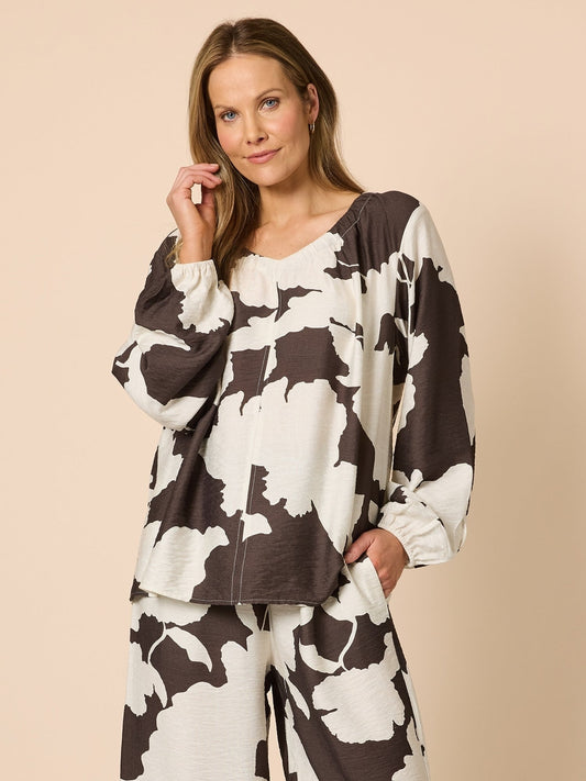 Image of a model wearing Tops. Product name - Toulouse Top Coffee Ivory in Coffee Ivory colour by brand - Clarity