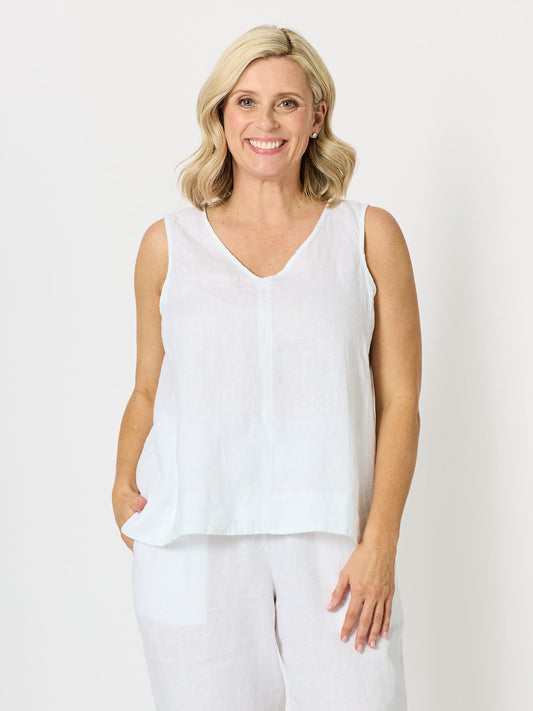 Image of a model wearing Tops. Product name - Tilly Linen Camisole White in White colour by brand - Gordon Smith