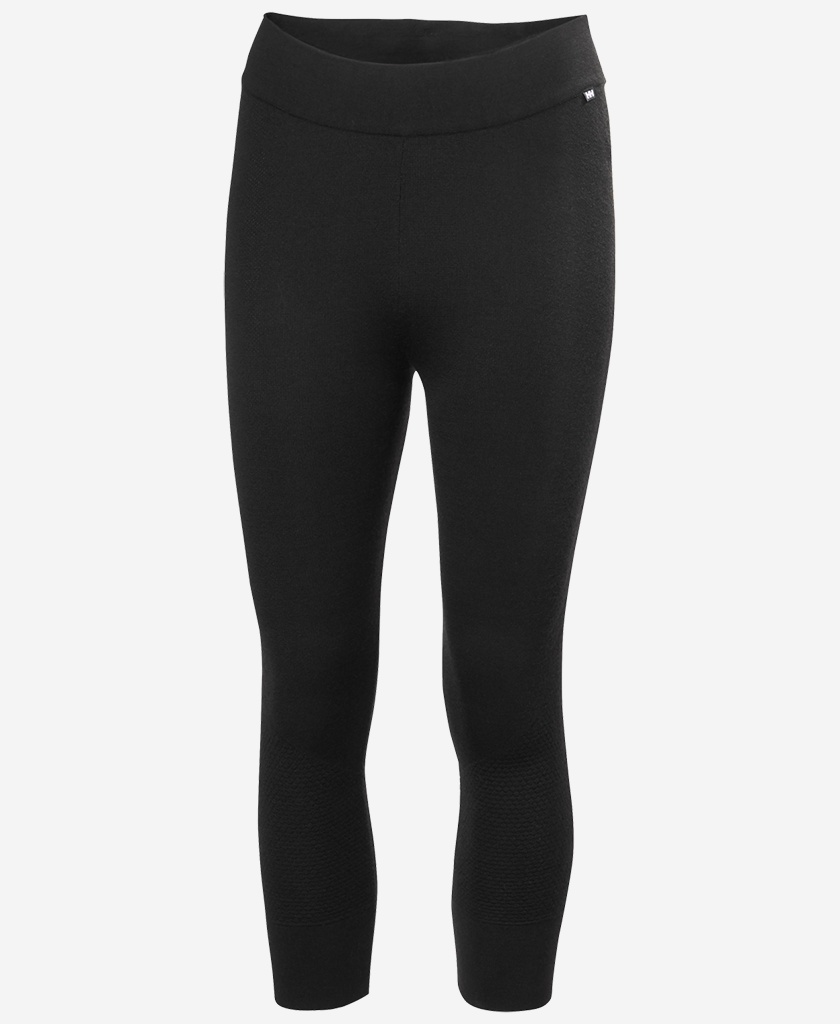 Image of a model wearing Pants. Product name - W LIFA MERINO KNITEVO 3/4 PANT, Black in Black colour by brand - Helly Hansen