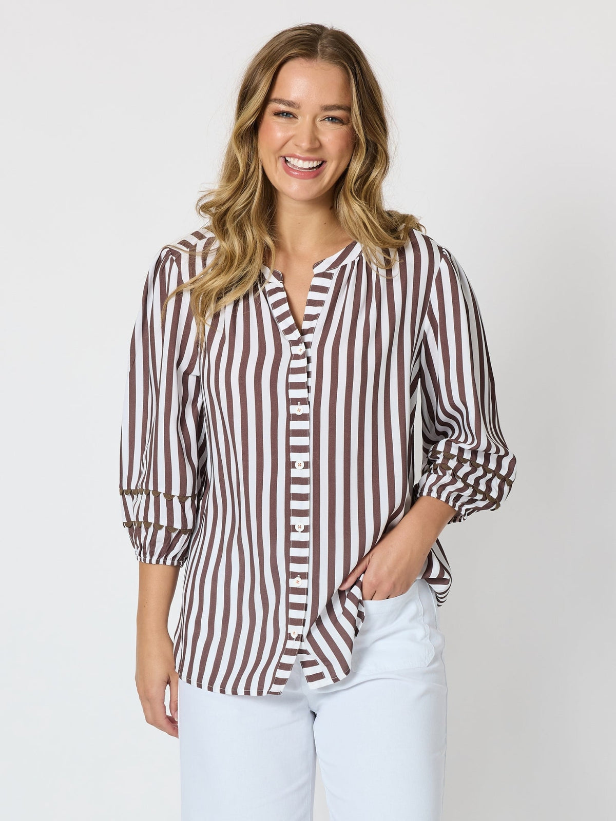 Image of a model wearing Tops. Product name - Montecito Stripe Print Top Coffee White in Coffee White colour by brand - Threadz