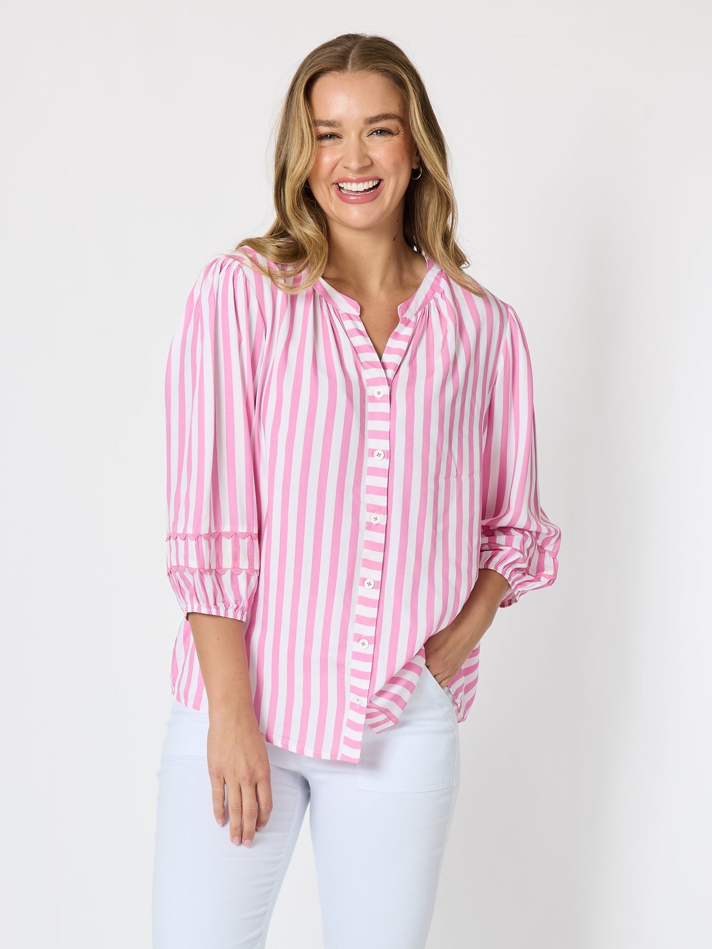 Image of a model wearing Tops. Product name - Montecito Stripe Print Top Lipstick White in Lipstick White colour by brand - Threadz